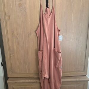 Salmon colored Free People Hot Shot Onsie